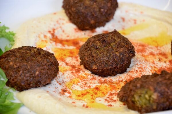 falafel, humus, smoked paprika, olive oil, salad leaves, plate, food, lettuce leaves, falafel, falafel, falafel, falafel, falafel, humus