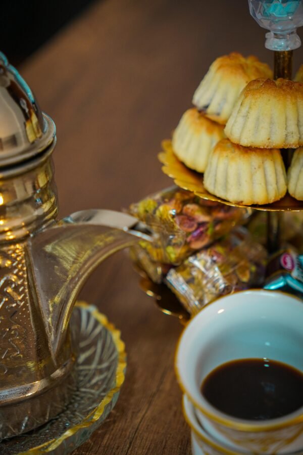 Elegant arrangement of Arabic coffee with sweets and traditional dessert in Istanbul, Turkey.